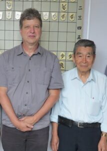 ジェームス会長と吉田前会長（左から）