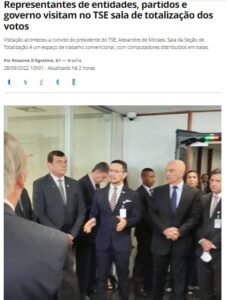 選挙高裁を訪問した人々に随行するモラエス長官（前列右から２人目、２８日付Ｇ１サイトの記事の一部）