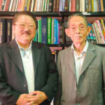 ブラジル熊本県文化交流協会の宮原ジョージさんと寒野会長（左から）
