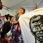 キロンボのイベントで掲げられたズンビーの肖像画（©Rovena Rosa/Agencia Brasil）