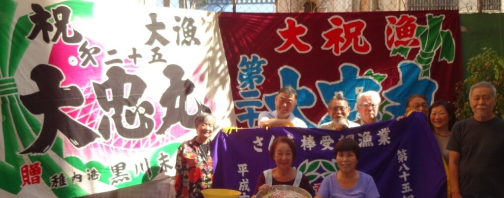 平野オストン・北海道協会会長（後列左から2人目）と中沢宏一オラプロノービス日本食探究会会長（後列左から3人目）