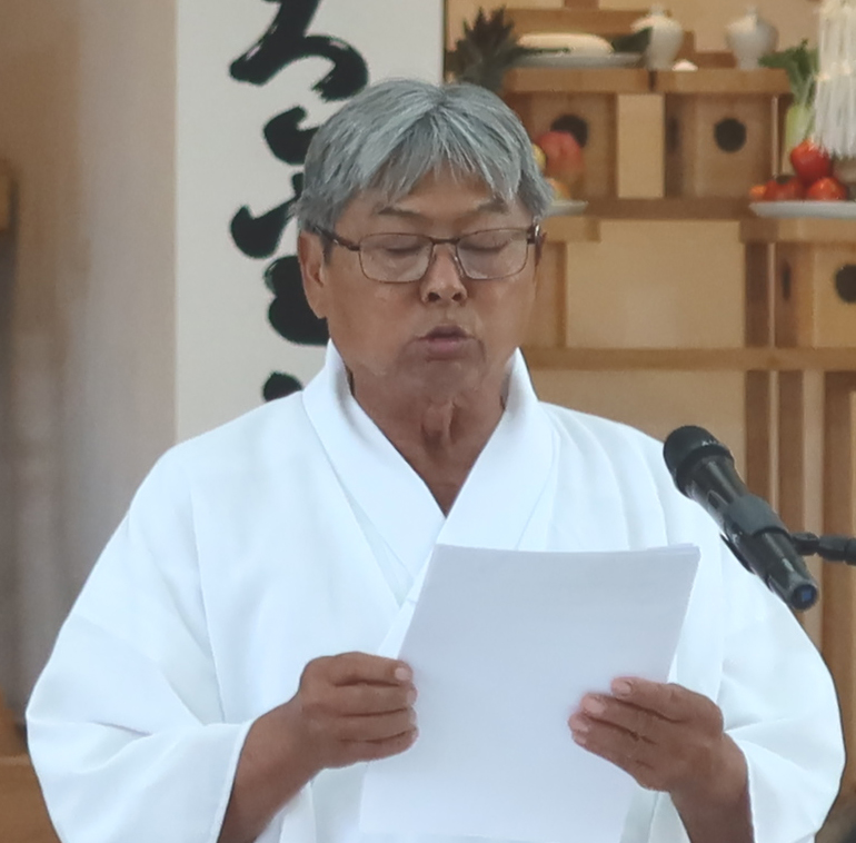 挨拶をする尾山マサオ南米本部長