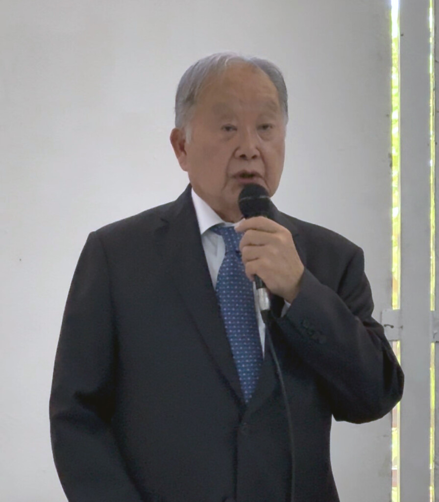 総会で挨拶する石川会長